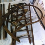 Badly damaged antique crib.