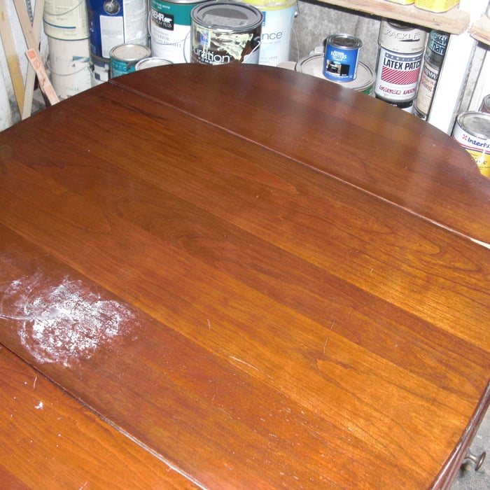 Table finish damaged by water rings