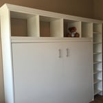 Custom hidden bed and storage system