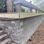 Retaining wall with bench