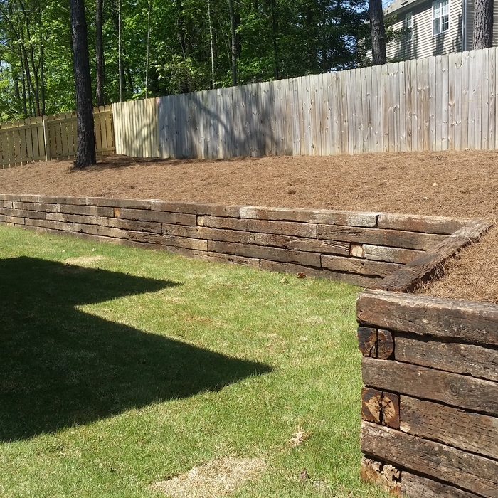 Retaining wall , pinestraw bed