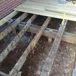 During pic of beam, post and joist repair
