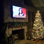 fireplace with stone facing and matching hearth
