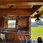 Large covered patio with outdoor kitchen