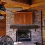 Large covered patio with outdoor fireplace