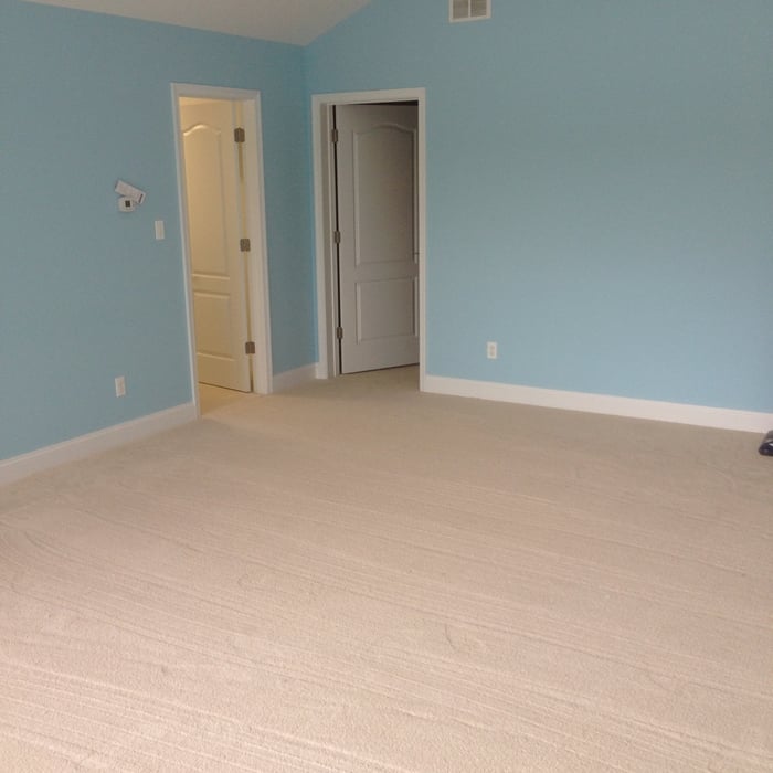Soft white carpet in master bedroom