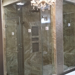Frameless shower steam unit