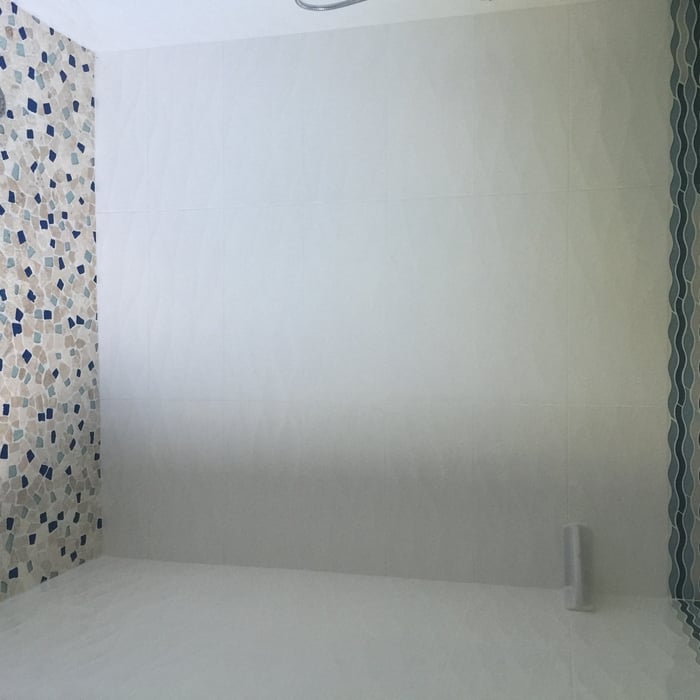 Bathroom with walk-in tiled shower