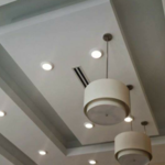 Modern ceiling with contemporary pendant lights.