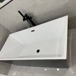 bath faucet and tub