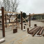 Staining logs carport