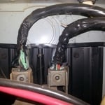 Old leads to main breaker are corroded and melted.