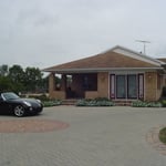 Homeowner brick paver driveway