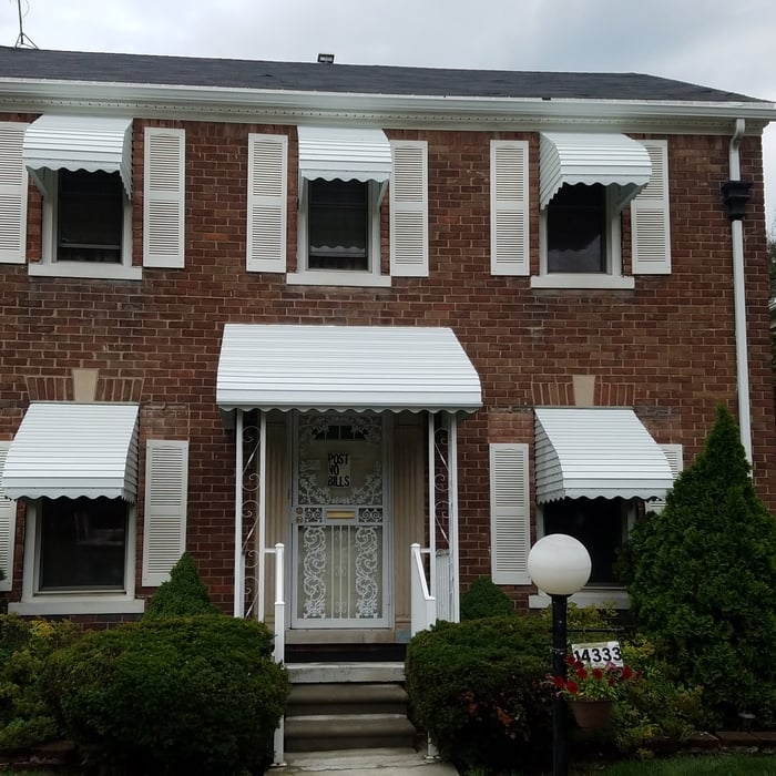 Traditional Awnings Over Window and Door