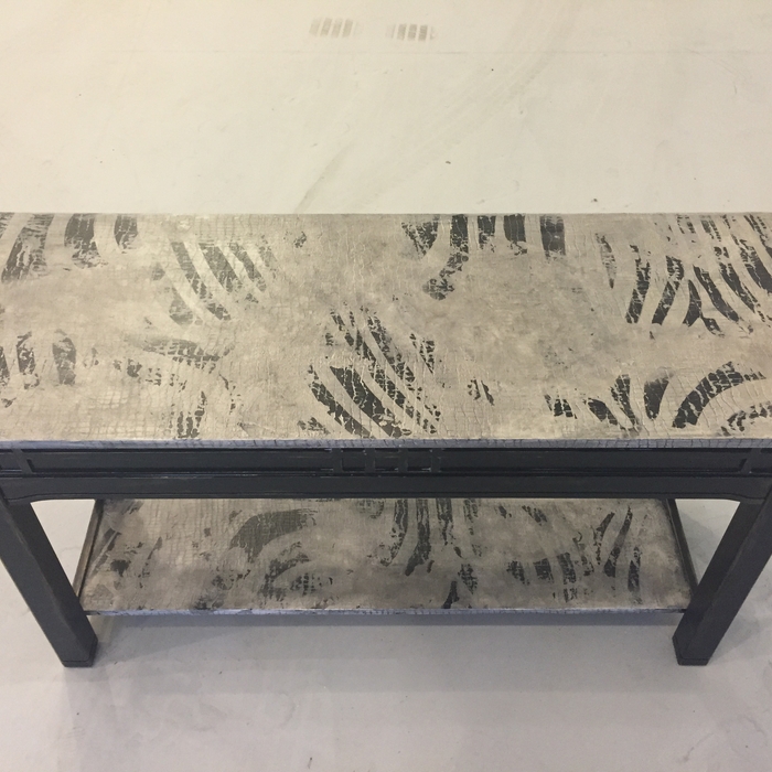 Zebra print sofa table.