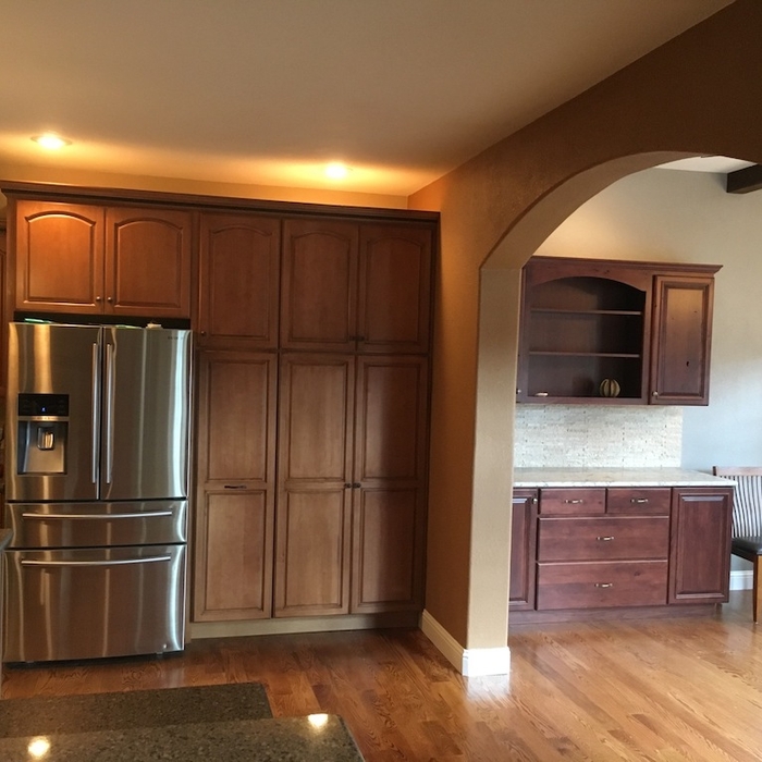After: New arched opening in place of window