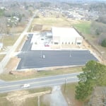 Half way of asphalt parking lot.