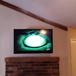TV mounted over Fireplace