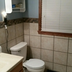 Toilet and faucet wall