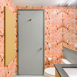 Wallpapered Bathroom.