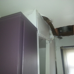 Car hits kitchen wall