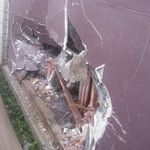 Car hits kitchen wall