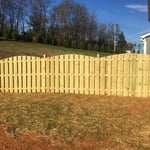 Shadowbox fence cut arch with frencsh gothic posts