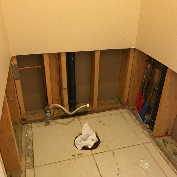 Plumbers repair damage