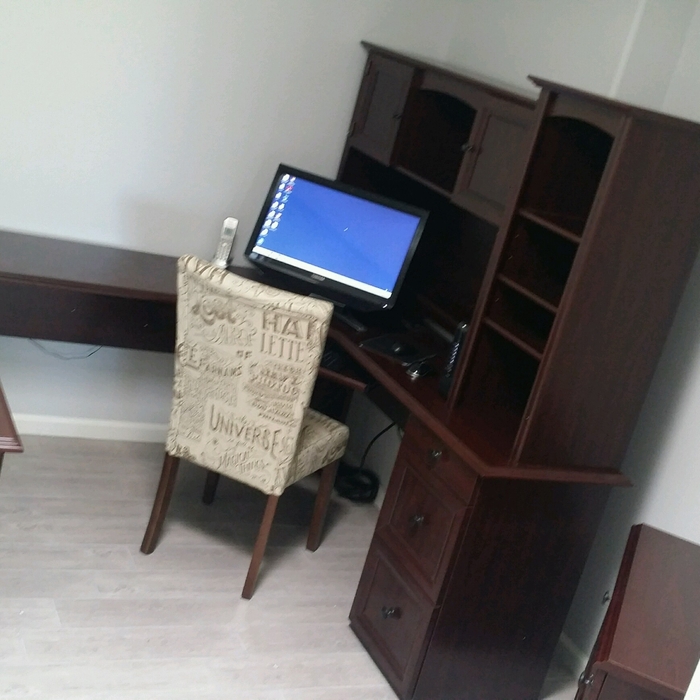 Computer desk setup with computer