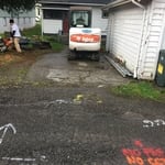 Getting set up to tear out old concrete pad