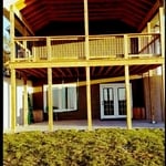 Treated deck with patio cover.