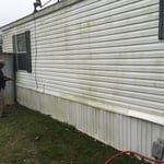 Pressure washing a home