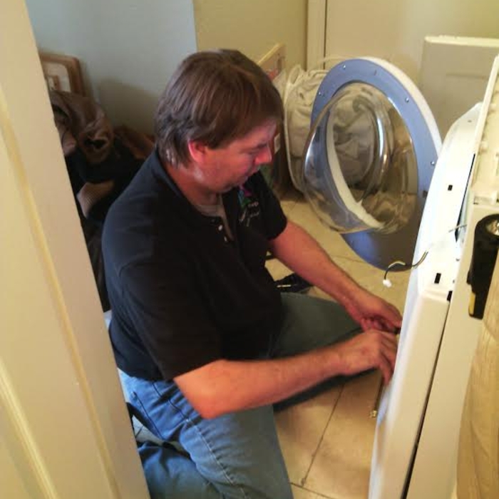 Chris repairing a Dryer
