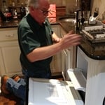 Clarence repairing an Ice Maker