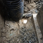 Exterior sump pump pit