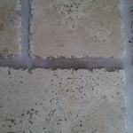 During: Steam Cleaning grout.