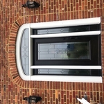Arch top entry door with sidelites