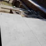 Rustic wood plank concrete pool deck
