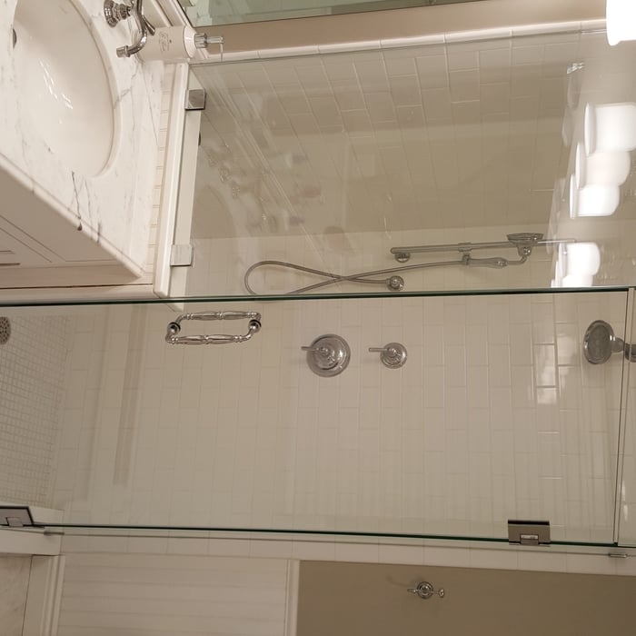 Frameless Shower Enclosure with Glass Bridge