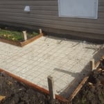 sidewalk wando pinned to house