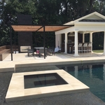 Attached Aluminum and Wood pergola with fireplace