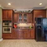 Cabinet wood cleaned and treated