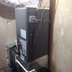 A/C air handler w/evaporator coil.