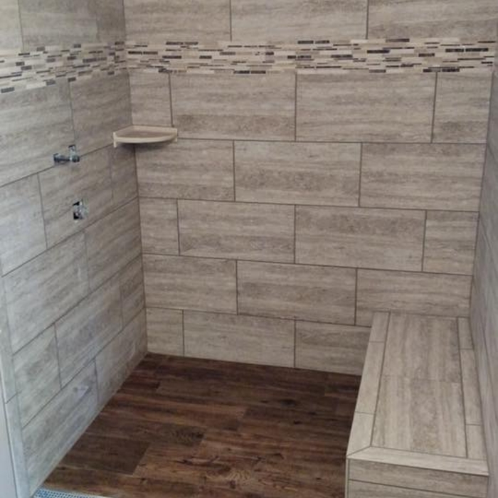 Walk in Shower with glass bandand abench