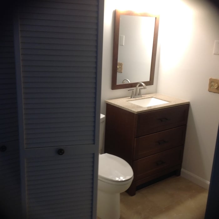 New vanity, toilet, mirror and lights