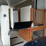 Wheelchair lift with landing gate
