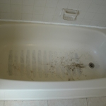 old discolored tub and tile