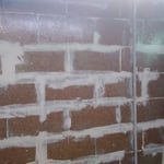 Basement walls and floor.
