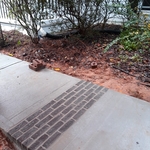 Walkway with brick inlay