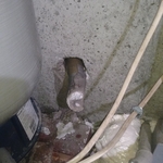 Drill head entering house.